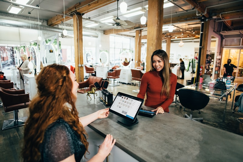 Customer paying with card at a counter